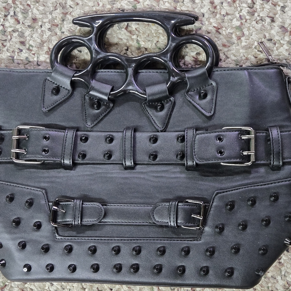 Brass knuckle purse